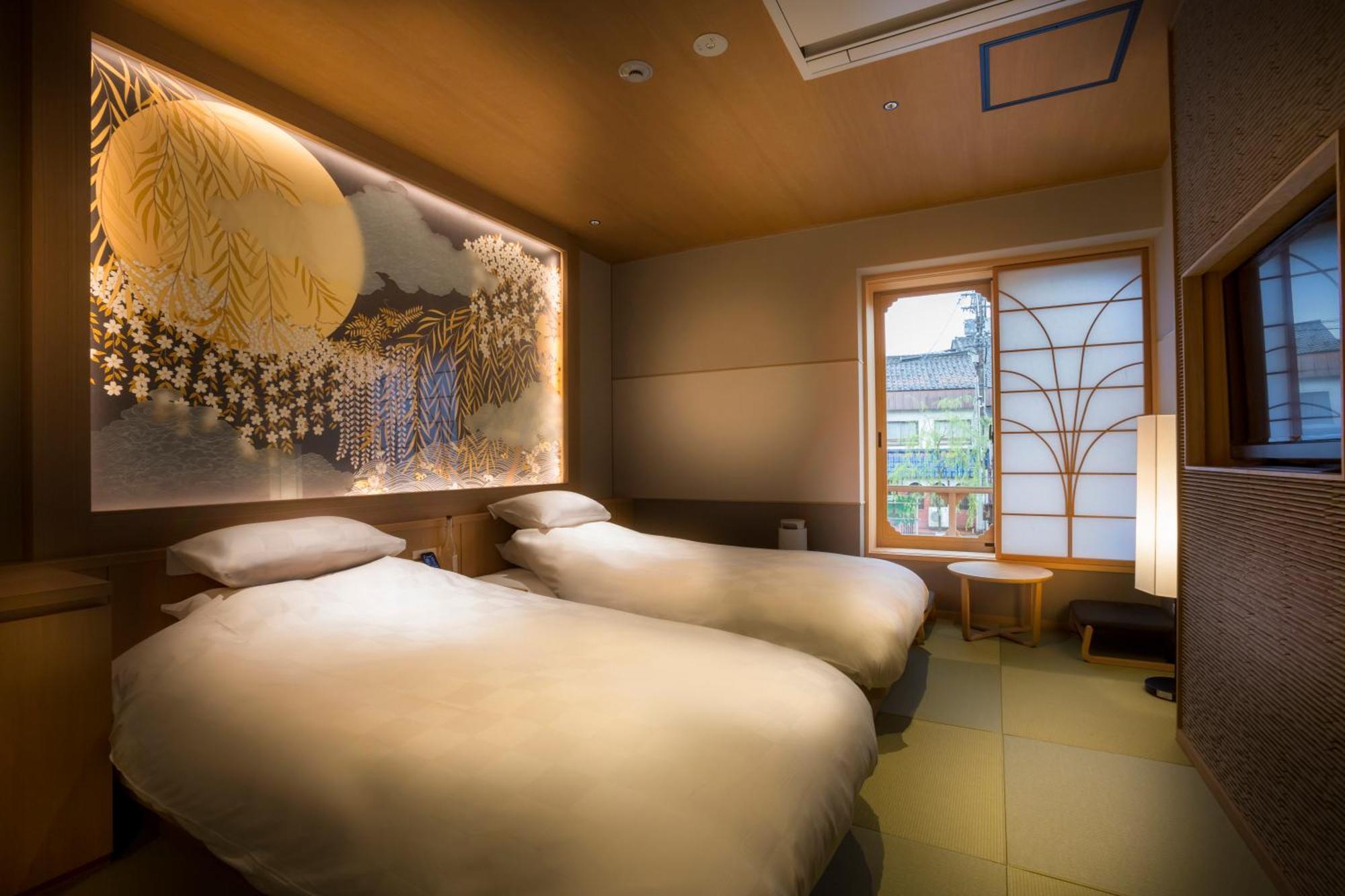Hotel Kinosaki Onsen Tokitotoki à Toyooka  Chambre photo