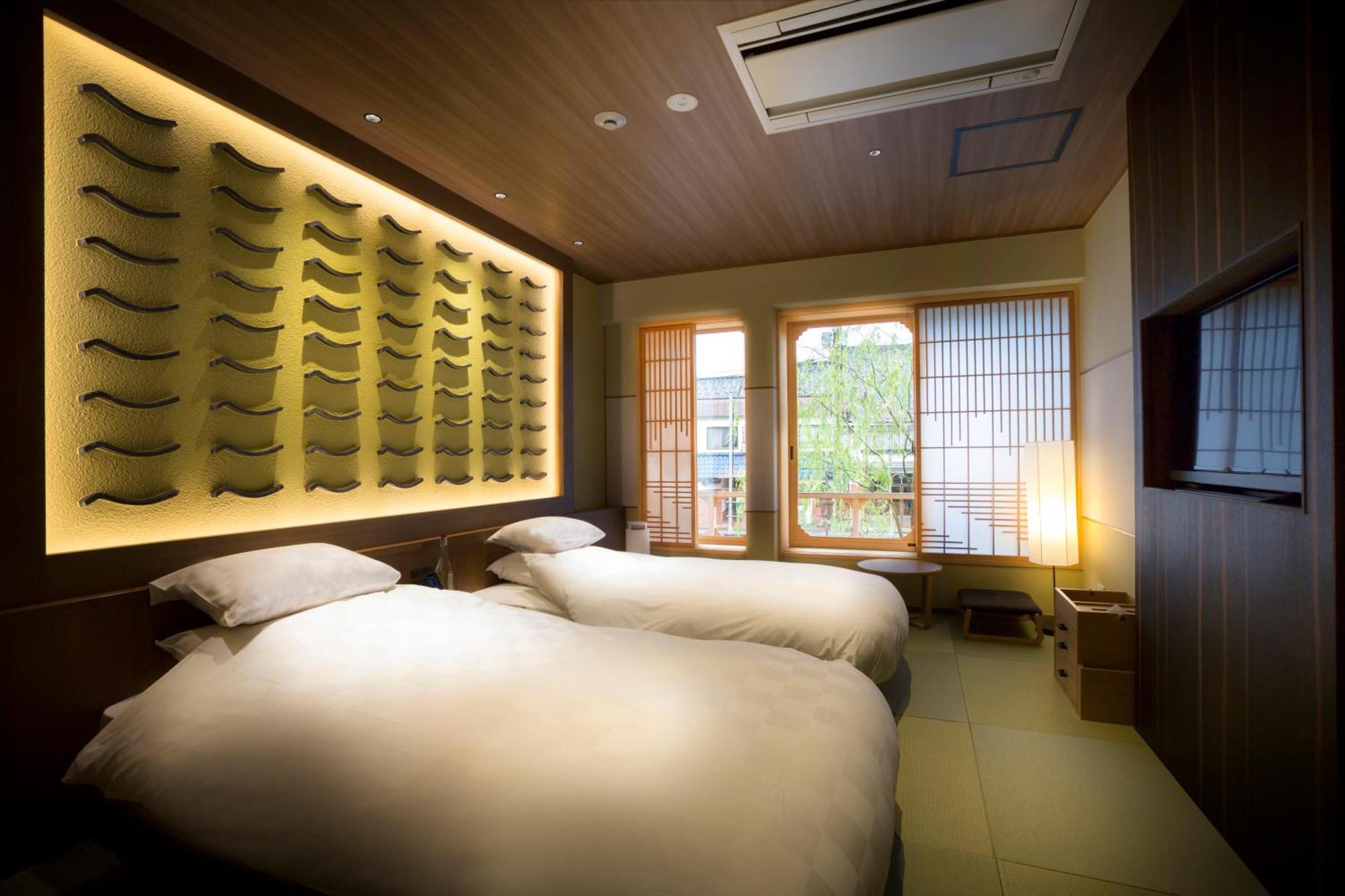 Hotel Kinosaki Onsen Tokitotoki à Toyooka  Chambre photo