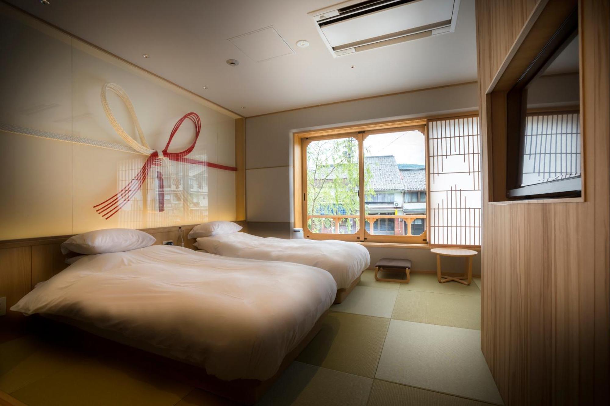 Hotel Kinosaki Onsen Tokitotoki à Toyooka  Extérieur photo